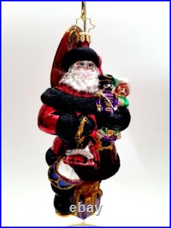Christopher Radko Swanky Gift Delivery #1020788 Santa Holding Nutcracker