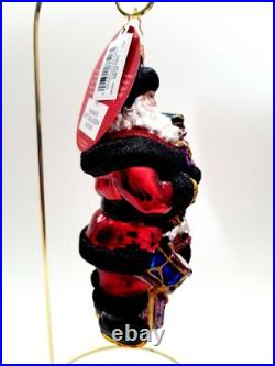 Christopher Radko Swanky Gift Delivery #1020788 Santa Holding Nutcracker