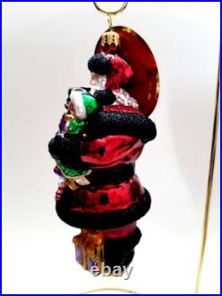 Christopher Radko Swanky Gift Delivery #1020788 Santa Holding Nutcracker