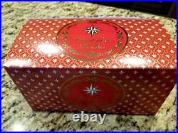 Christopher Radko Swanky Gift Delivery #1020788 Santa Holding Nutcracker
